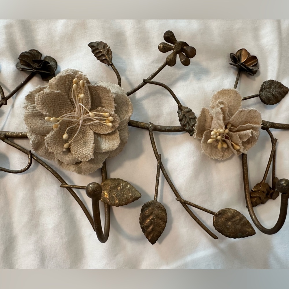 Rustic metal necklace holder with fabric flowers